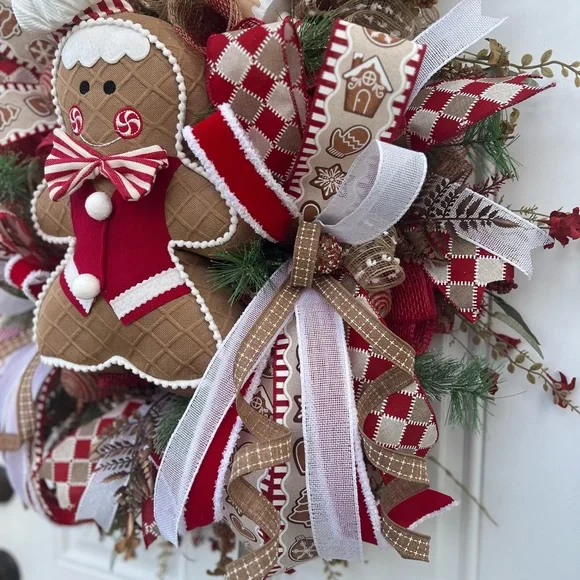 Adorable Red and White Gingerbread Holiday Wreath. Aprox 26” wide